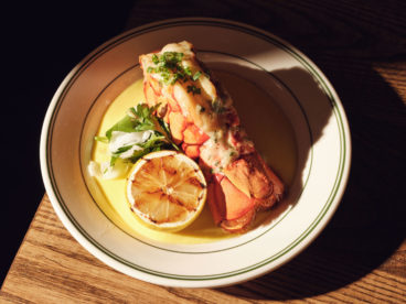 toronto-restaurants-st-johns-tavern-entertainment-district-lobster-tail A whole baked lobster tail dressed with parsley fennel and lime juice is served over a sweet corn purée